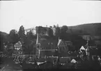 Skioptikonbild med motiv av vy över Stolberg med Schloss Stolberg på höjden.
Bilden har förvarats i kartong märkt: Vårresan 1909. Stolberg 7. IX. Text på bild: 