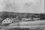 Foto av foto tillhörande Postmästare Helmer Lagergren, Falun (1942). Klosters Bruk efter branden i valsverket 1866.