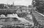 Sågdammen -Sågbron - Sågfallet. I bakgrunden Snickerifabriken och kyrkan.