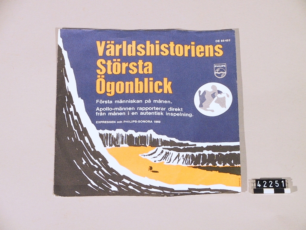 Grammofonskiva av plast. Apollomännen rapporterar direkt från månen i en autentisk inspelning, Apollo XI (1969).