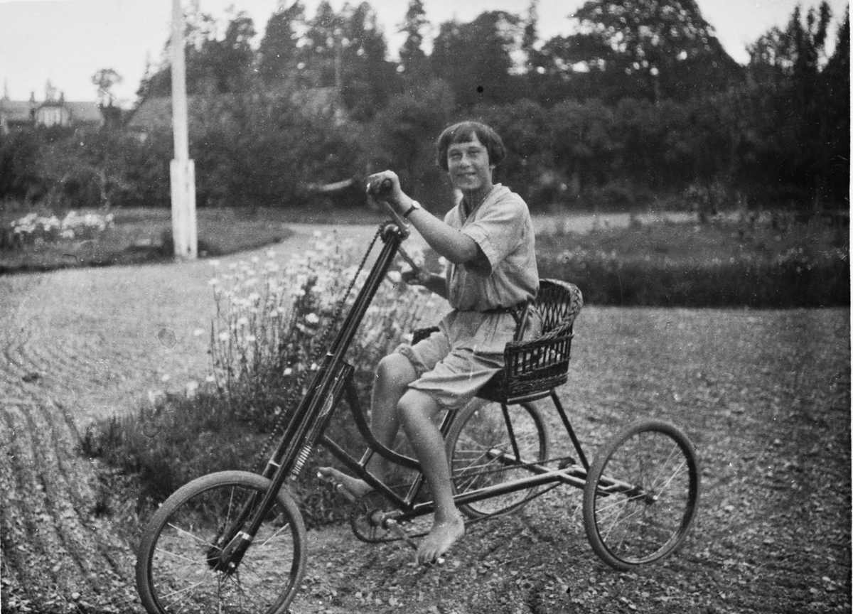 Trehjulig handikappcykel.