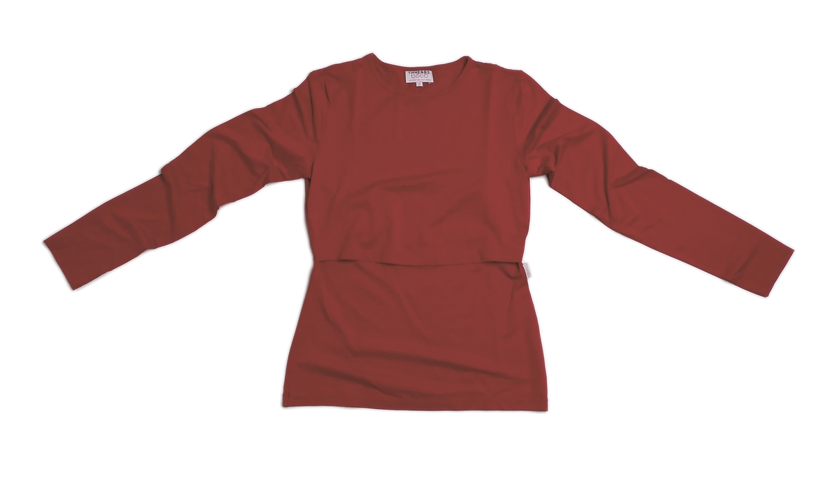 Mammakläder. Boob är kläder för mammor som vill kunna amma smidigt och samtidigt kunna känna sig snyggt klädda. På samtliga modeller ligger tyget dubbelt över bysten så att en omlottöppning bildas. Kläderna ingår i vårkollektionen 2002. Materialet är 95 procent viskos och 5 procent lycra.