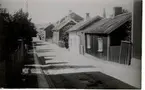 Kv. Tunnbindaren 4. Repslagaregatans övre del 1930. Närmast Repslagaregatan 18. Kv. Nattvakten. Nedanför: Repslagaregatan 20 och Rödestensgatan.
