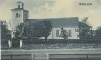 Vykort över Målilla kyrka som byggdes i nyklassicistisk stil mellan 1820-1822.