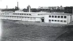 AB Kalmar nya tapetfabrik vid Södra vägen 1939 .
Observera gasklockan i bakgrunden.