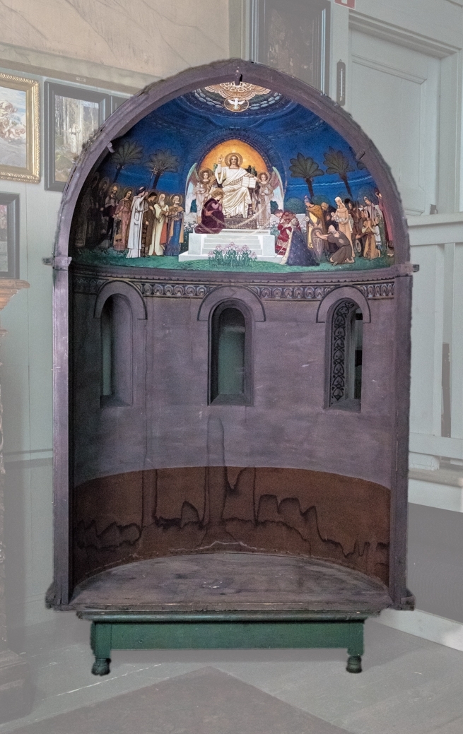 Modell till Lunds domkyrkas korabsid. I den halvsfäriska kupolen avbildas Jesus sittande i centrum på en upphöjd tron med höjd vänsterarm, Majestas Domini. I den högra hand håller han en bok. På var sida om honom en ängel. Över Jesus en guldfärgad mandorla. Framför tronen liljor. Till vänster om tronen stående figurer med glorior och text:Mattheus, Markus, Lukas, Johannes, Ansgarius, Laurentius, Paulus och Petrus. Till höger delvis stående, delvis knäböjande fgurer, t.ex. biskop med kräkla, kvinna med lindebarn och en fattig man. Mörkblå bakgrund med palmer. Ovanför Jesus i kupolens mitt en vit duva, troligen Andens duva med korsgloria, och Jahve på hebreiska. 
Under motivet dekorativt utformade bårder. Nedanför motivet tre utsparade fönster. Väggen målad i grått och brunt.