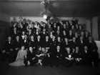 Postmännens fest Royal år 1936, 11520.
Första raden (bakre raden) 7 från vänster: Alfhild Lindholm, 10: Viola Larsén.
Andra raden: 4: Jarl Persson, 6: Lars Blohm, 8:Ragnar Larsén, 9: K Kjellbergs hustru, 10: Knut Kjellberg.
Tredje raden: 1 Hugo Håkansson4: Gösta Roswall, 10: Knut Sjövall, 12: Anton Olsson.
Fjärde raden: 7: Ernst Persson
Femte raden (sittande): 2: Johan Kjellberg, 4: Birger 