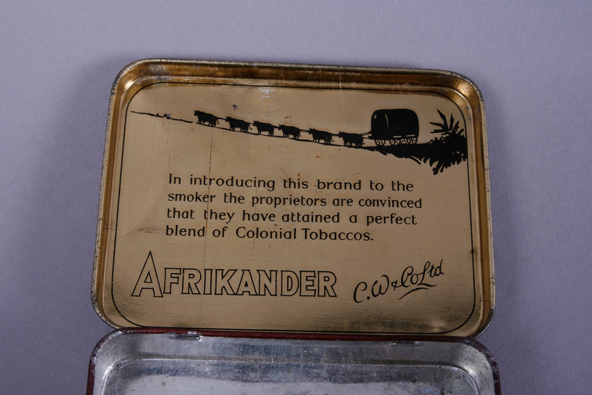 Afrikansk landskap. Kjerre med trekkdyr i bakgrunnen.