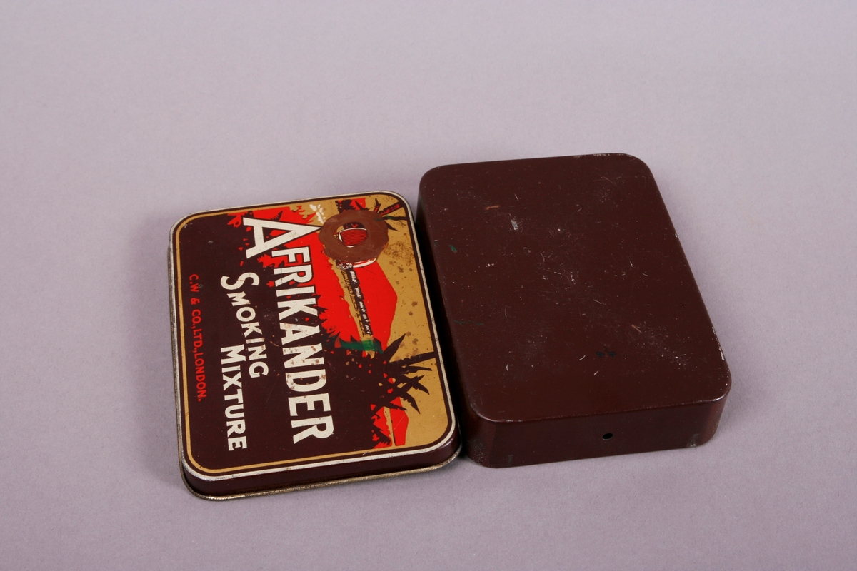 Afrikansk landskap. Kjerre med trekkdyr i bakgrunnen.