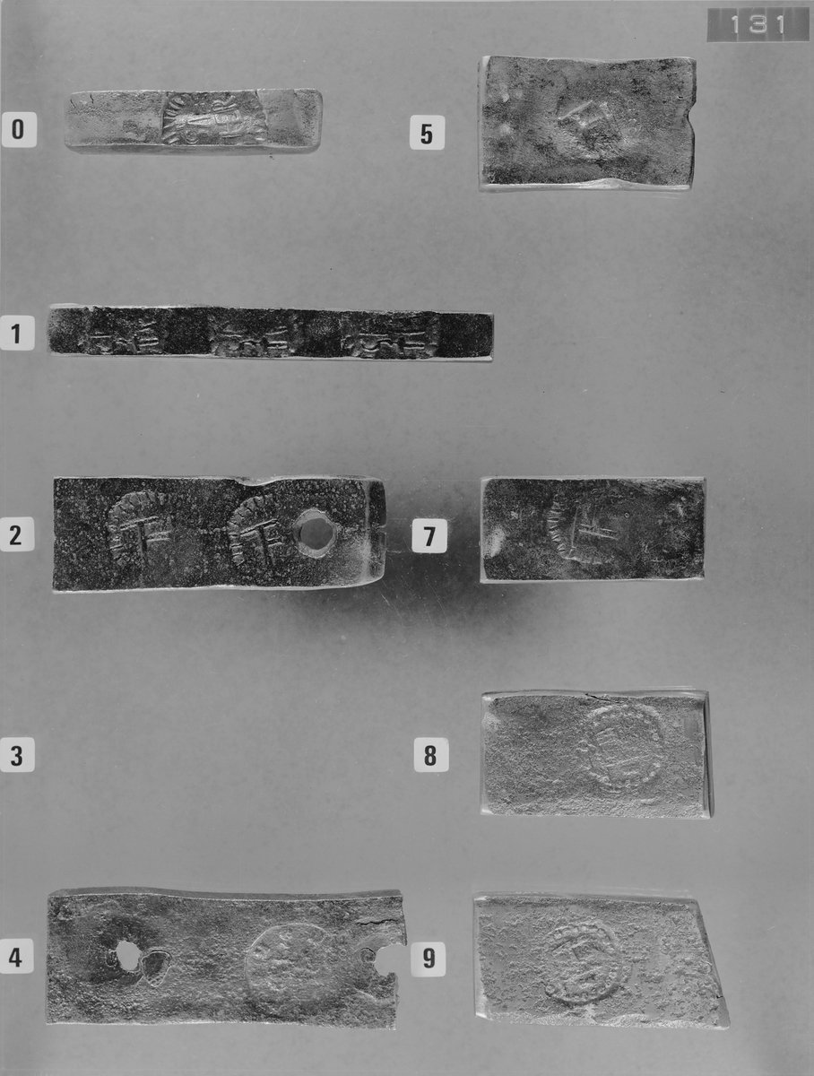 Avtryck av järnstämpel i prov av stångjärn. 