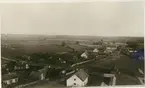 Bebyggelsen kring kyrkan i Algutsrum vid sekelskiftet 1900.