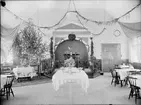 Baptistkyrkan dekorerad inför Adrian och Hilma Bomans bröllop, Östhammar, Uppland 1925