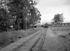 Bild tagen för Naftasyndikatets räkning vid deras anläggning i Yttre hamn år 1933. Av de tidiga byggnaderna från Yttre hamns ursprung för ca 100 år sedan återstår bara hamnkaptenens bostad och det hus där förr café Gulan fanns.