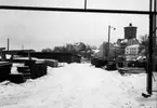 Göthlins rör i Inre Hamn år 1950. Hus längs Strandvägen i bakgrunden.