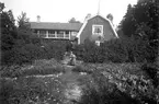 Trädgårdsmästare Larssons ännu kvarstående villa i Gräsdalen på en bild från 1922.