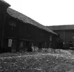 Ekonomibyggnader i kvarteret Almen före renovering i slutet av 1960-talet.
