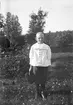 I trädgården. Tidsomfånget är 1900 - 1940