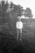 Vid trädgården. Tidsomfånget är 1900 - 1940