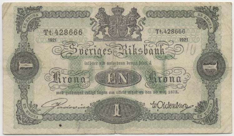 1 krona 1921.
Littbokstav/nr: Tt,428666.
Sedeltyp: Stora Riksvapnet.
Konstnär: Per Olof Bagge.
I folkmun kallad kotia eller Hagalundstia i Stockholmstrakten.
Övrigt: Litteratur: Sveriges sedlar sid 80 nr 10.
Funktion: Betalningsmedel