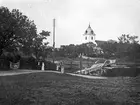 Husby kyrka. Flottbron över Dalälven. Bron revs 1929