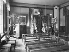 Bönsalen på Själanderska Flickskolan. Linnéfesten. Den 23 maj 1907. Fotot tillhör Majken Swedlund.