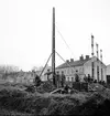 Reportage för Gefle Dagblad. Resning av stolpar. Centralen. År 1936