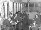 Den 11 december 1943. Soldathemmets Café.