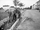 Trottoarläggning

9 september 1946