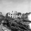 Rivning av gård på Brynäs för nya punkthus. 1947. Reportage för Norrlands-Posten.