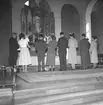 Barndop i Staffans kyrka, kyrkoherde Per Bolinder.       22 augusti 1954.