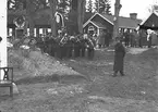 År 1938. Korparations skjutning. Reportage för Gefle-Posten. Orkester
