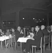 Konsum Alfa 50-årsjubileum på Rotundan, Folkparken. Medaljutdelning och middagsbord. 25 november 1948.