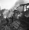 Brand i Olssons lumpupplag vid vagnsverkstaden. Maj 1947.