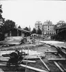 Bild tagen i samband med arbetet att uppföra Gävle Museum åren 1938-40. I bakgrunden syns Grand Hotell på andra sidan Gavleån.