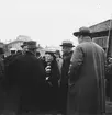 Grundstenen för Gävle Museum lägges 26 oktober 1938. Fru Formelli (syster till Antonie Rettig) i samspråk med bla. borgmästare Nils Berlin och länsintendent  dr. Philibert Humbla museets förste chef. (Fru Formelli har identifierats från en bild i en artikel om evenemanget som publicerades i Norrlandsposten torsdagen 27 oktober 1938)