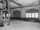 Bottenvåningen med två exenterpressar av äldre modell.

Fastigheten byggd 1895? för AB Åkerredskap, övertagen 1928 av AB ATSA. Nu i Förenade Well´s ägo.