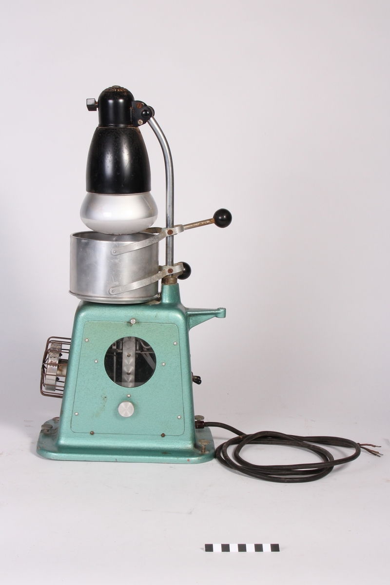 Instrument til å måle fuktighet. Lampe øverst.