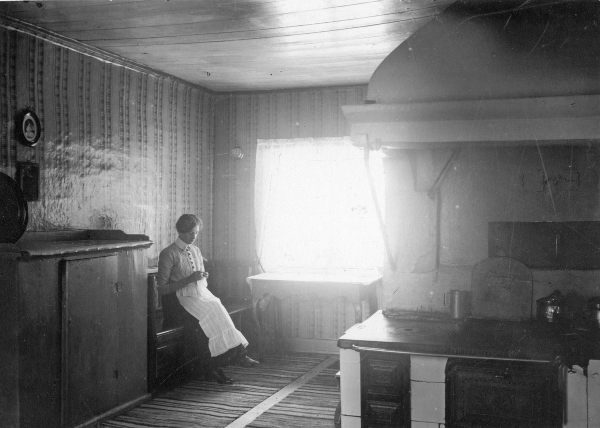 Kvinna