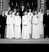 Strömkvist, kyrkoherde med konfirmander.