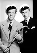 Kandidaterna Hans Bäcklund och Ulf Berne. Hans Bäcklund, överläkare, son till tandläkare Ragnar Bäcklund och hans hustru Greta, född Hildebrand, samt hans kusin överstelöjtnant Ulf Gunnar Berne, son till lantmätare kapten Otto Berne och hans hustru Majken, född Hildebrand.