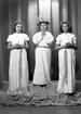 Lucia med tärnor. Ulla och Berit Larsson med en kamrat. 13 december 1945.