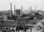Sandvikens Järnverk omkring 1930.
I mitten på bilden ligger martinverk 1 och 2. Martinmetoden var under 1900-talets första årtionden den dominerande metoden för stålframställning.
Klensmedjan är placerad i förgrunden till vänster och i bakgrunden till höger skymtar hyttan med rostugnar och masugnsbyggnad.
