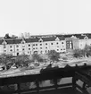 Magasinbyggnader på Alderholmen.
Norra Strandgatan i förgrunden.