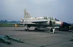 Flygplan SK 37 Viggen nummer 22 från FC uppställt vid flygdagen på Malmen, 10 september 1972. Bildserie.