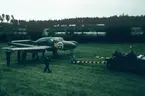 Flygplan J 21A ur F 12 Kalmar bogseras under flygdagarna på Malmen 1-2 september 1962, vid firande av militärflyget 50 år.