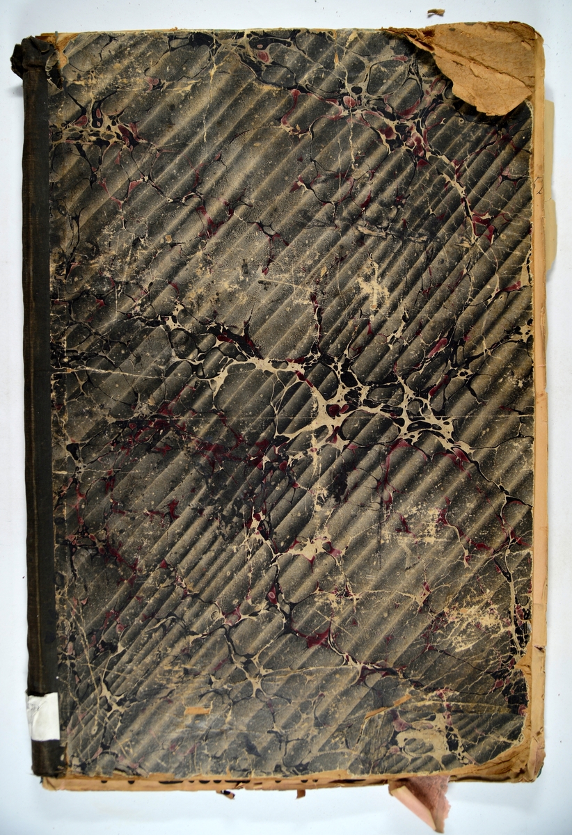 Bok med trykkblokkmønstre fra farver H. N. Schjølbergs arkiv.