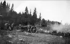 Haubits 10,5 cm m/17 under eldgivning, år 1920.