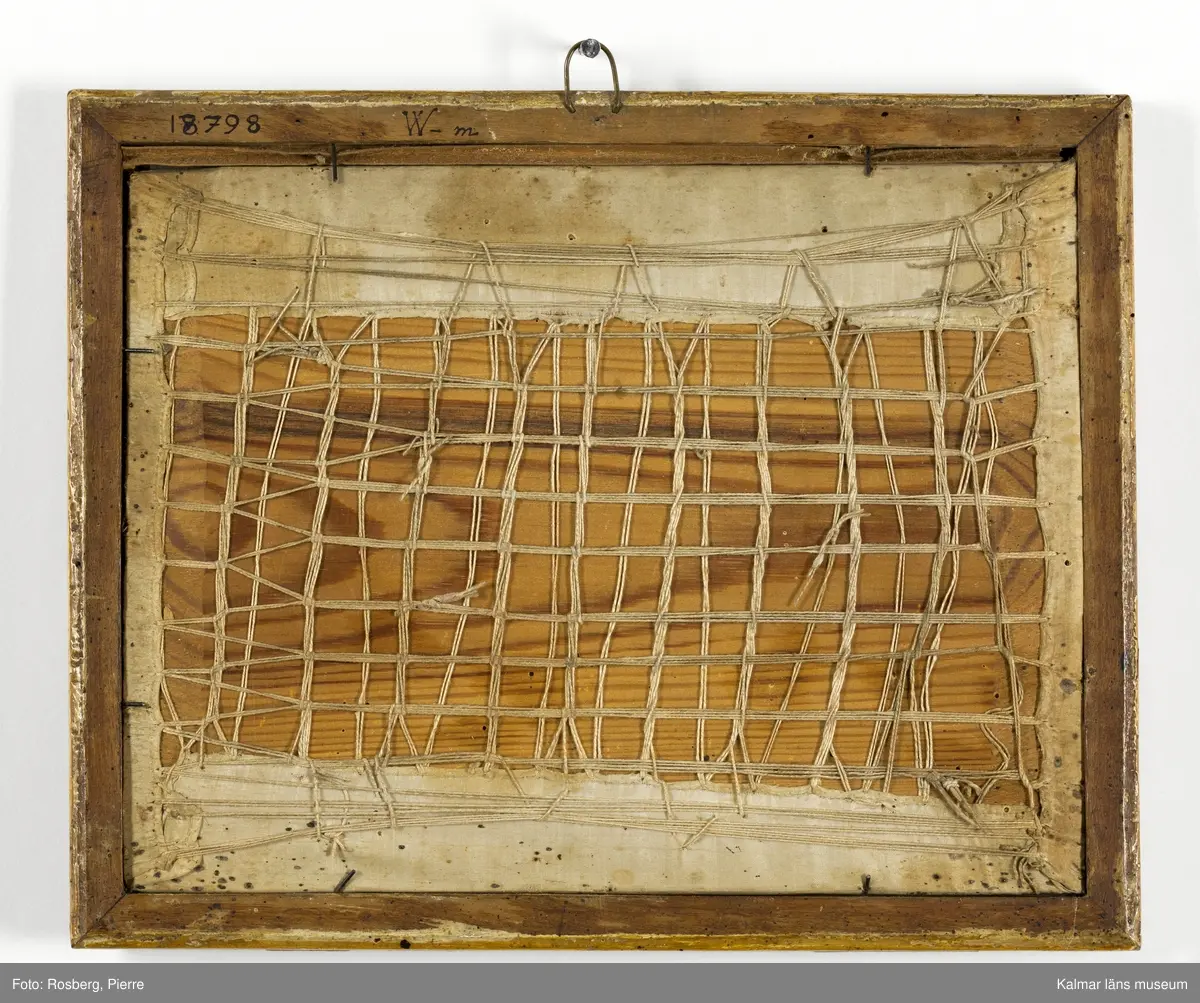 Landskap med figurscen, Amor och Psyke. En halvliggande Psyke med den bevingade Amor till vänster i motivet.