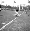 Fotbollsmatch. År 1936