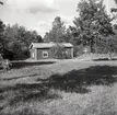 En enkelstuga på Misterhults hembygdsgård.
